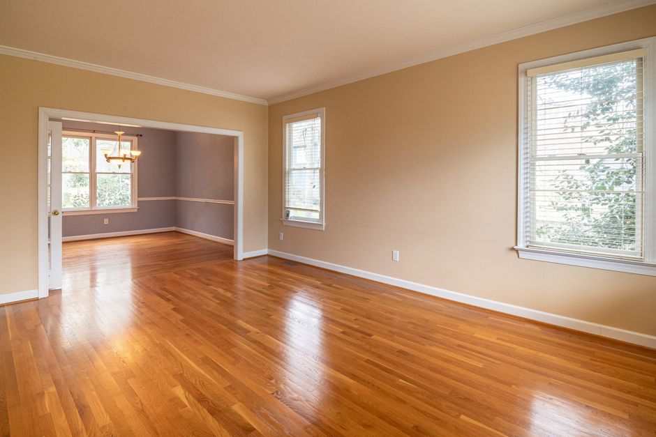 White oak hardwood floor running through an open living room